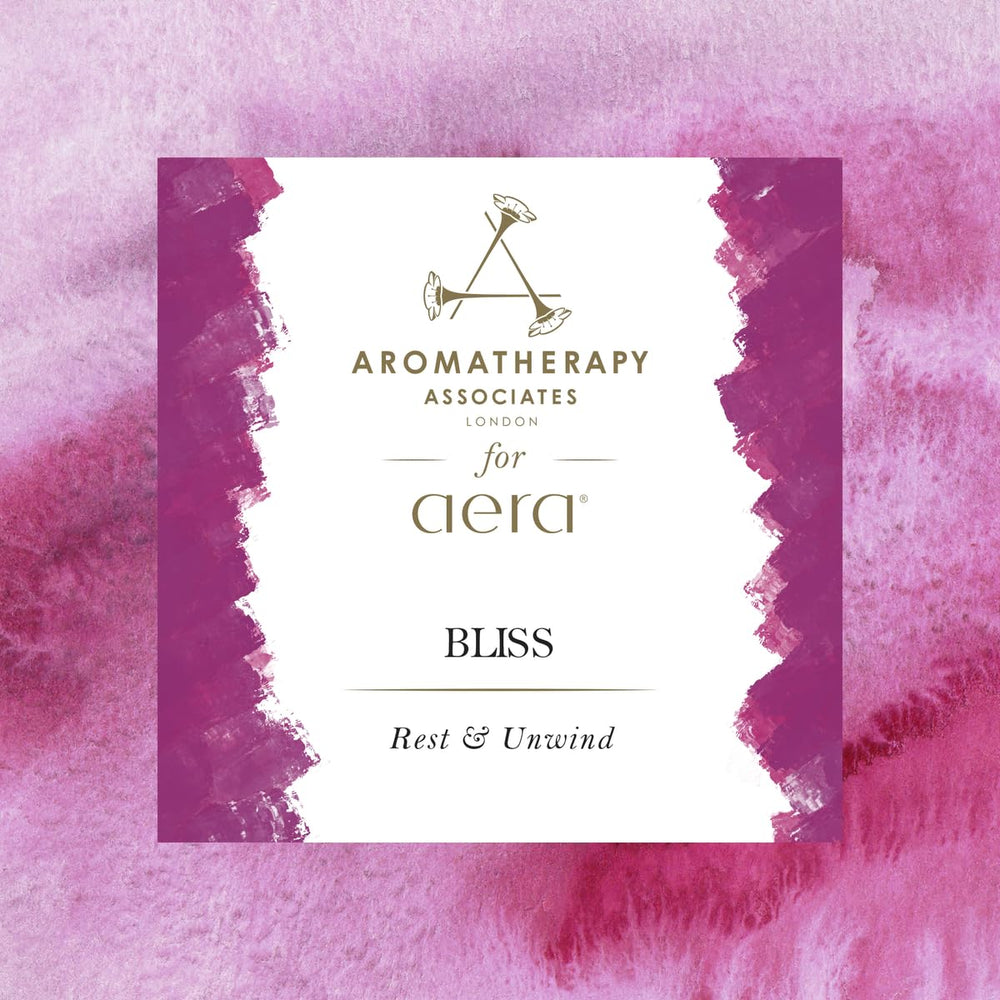 Aera Mini Bliss bottle closeup highlighting premium notes that elevate everyday atmosphere.