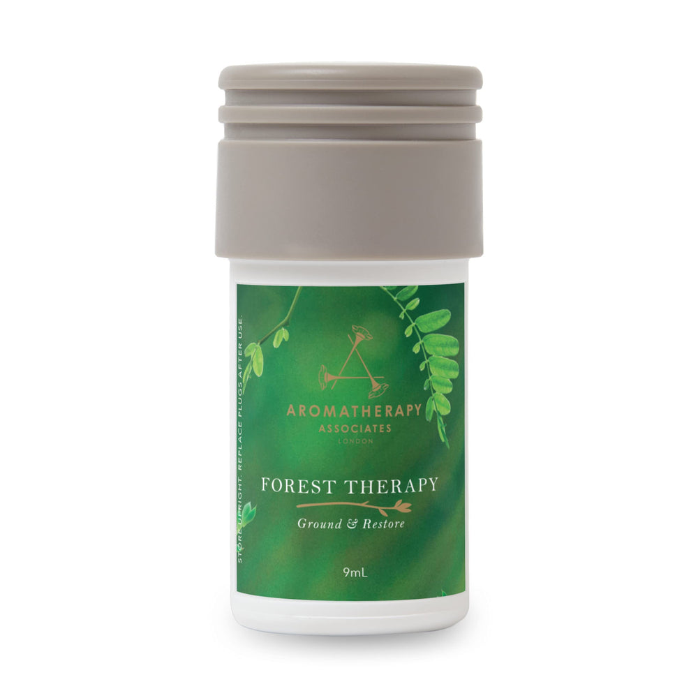 AERA Mini forest therapy refill bottle with pink pepper, cypress, and ho wood notes.