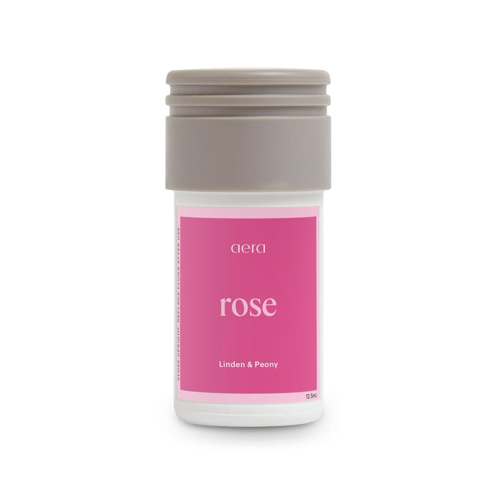 Aera Mini Rose diffuser close-up highlighting luxurious floral notes for a welcoming home scent