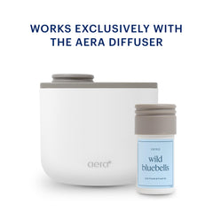 Aera Mini Wild Bluebells diffuser scene in a bright living room