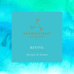 Aera Revive bottle highlighting grapefruit notes for bright environments.