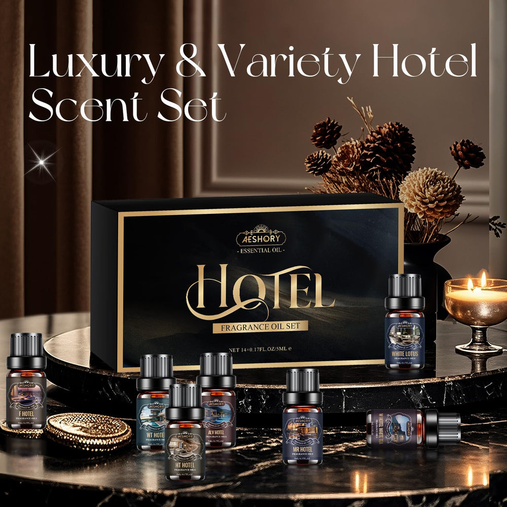 Aeshory diffuser oils arranged with a diffuser to evoke hotel ambiance.