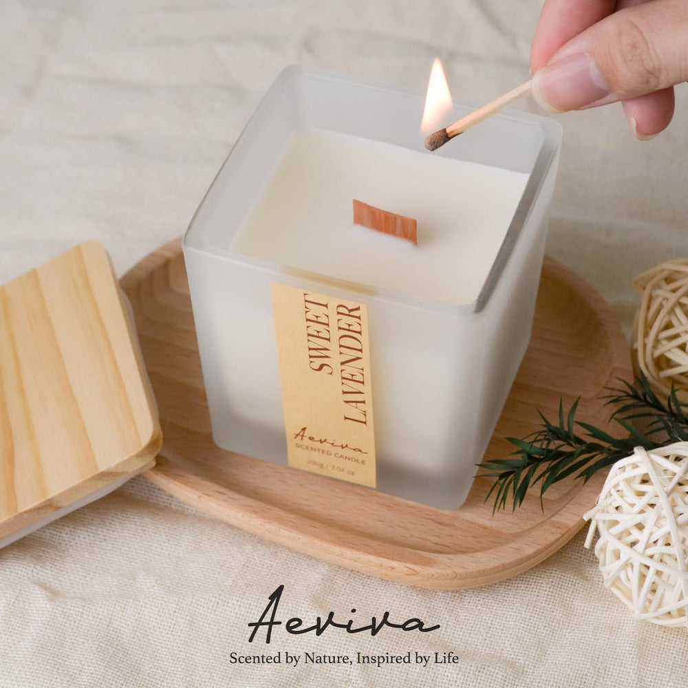 Aeviva candle in ivory packaging offers chic, gender-neutral gifting.
