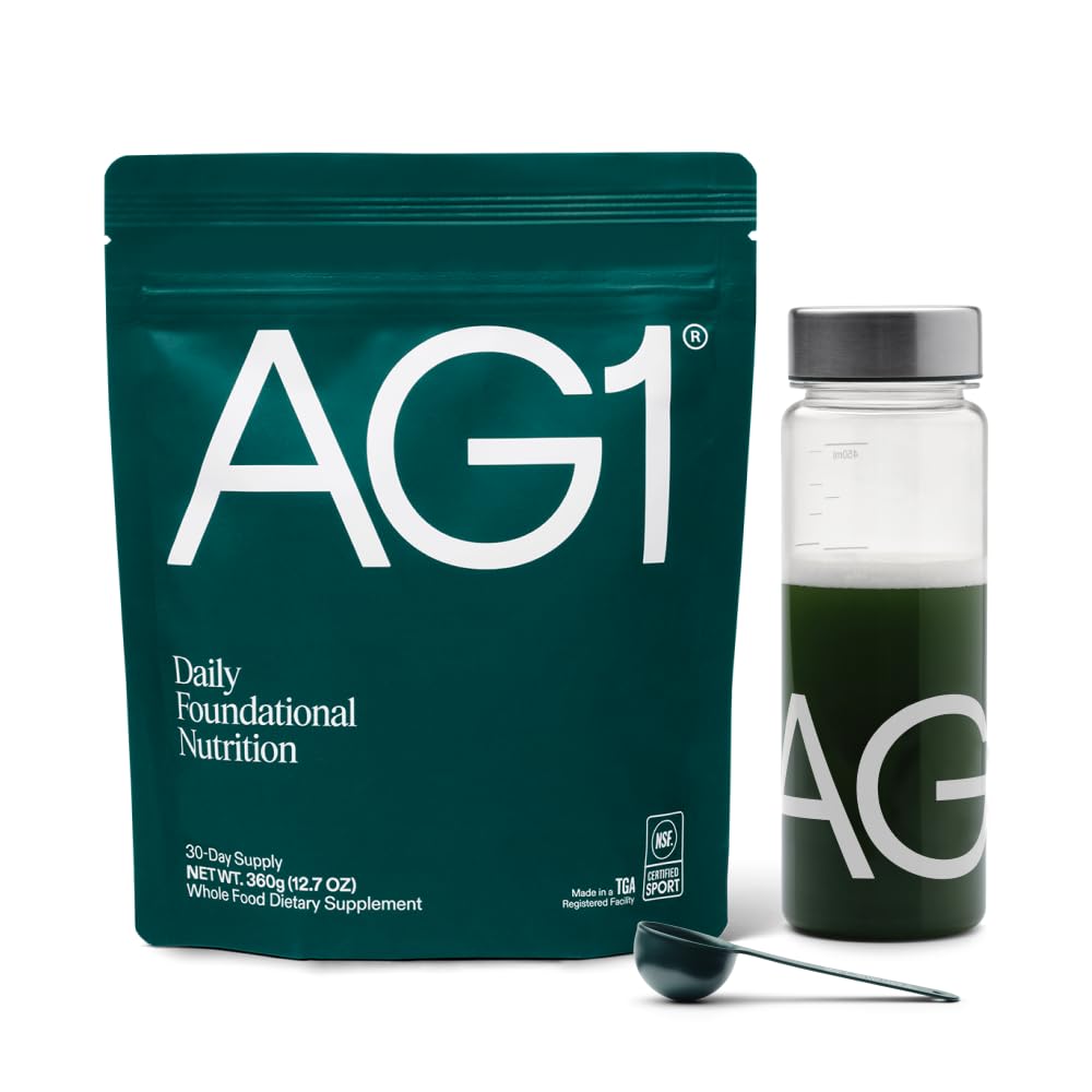 AG1 greens powder tub label highlighting ingredients for daily nutrient coverage and gut support.