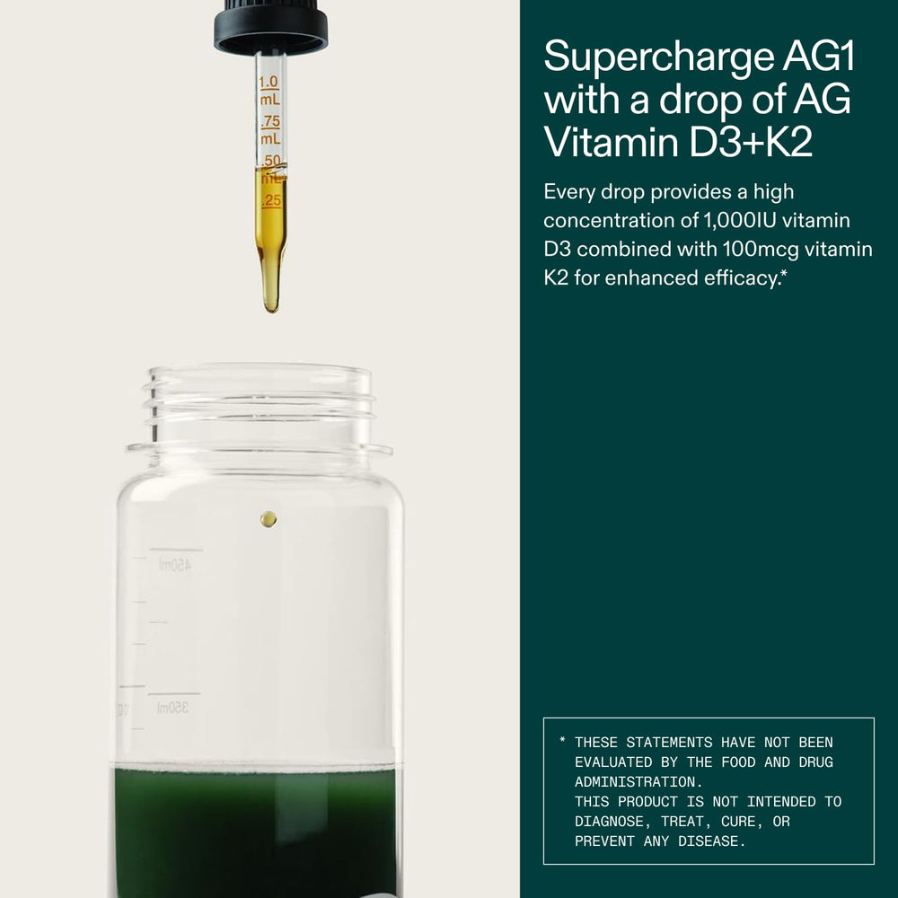 Pouring action demonstrates simple daily use of AG1 D3+K2 drops.