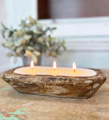 Aira mistletoe aroma candle enhancing cozy holiday moments.