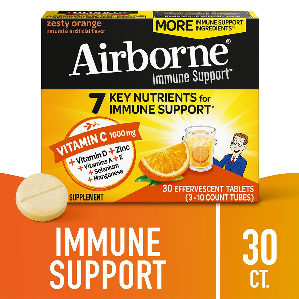 Airborne dissolving tablet in water shows quick, refreshing orange fizz.