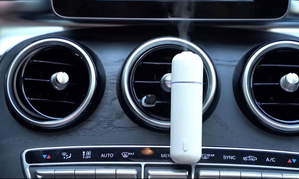 Aires Scent battery-powered diffuser for long-lasting scent on trips.