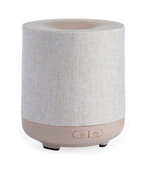 Airome Ceramic Essential Oil Diffuser with 100 mL tank releasing a subtle aromatic mist.