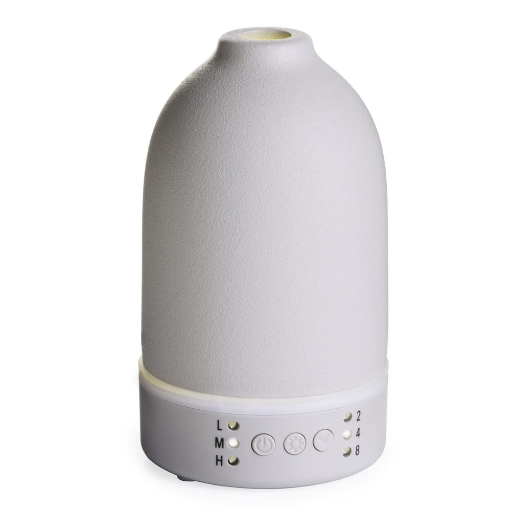 Airome Nebulizer Diffuser with stone finish creates elegant room ambiance and aroma diffusion.