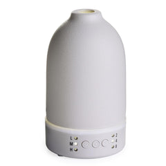 Airome Nebulizer Diffuser with stone finish creates elegant room ambiance and aroma diffusion.