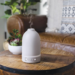 Airome Nebulizer Diffuser shows off white LED light for relaxing home ambiance.