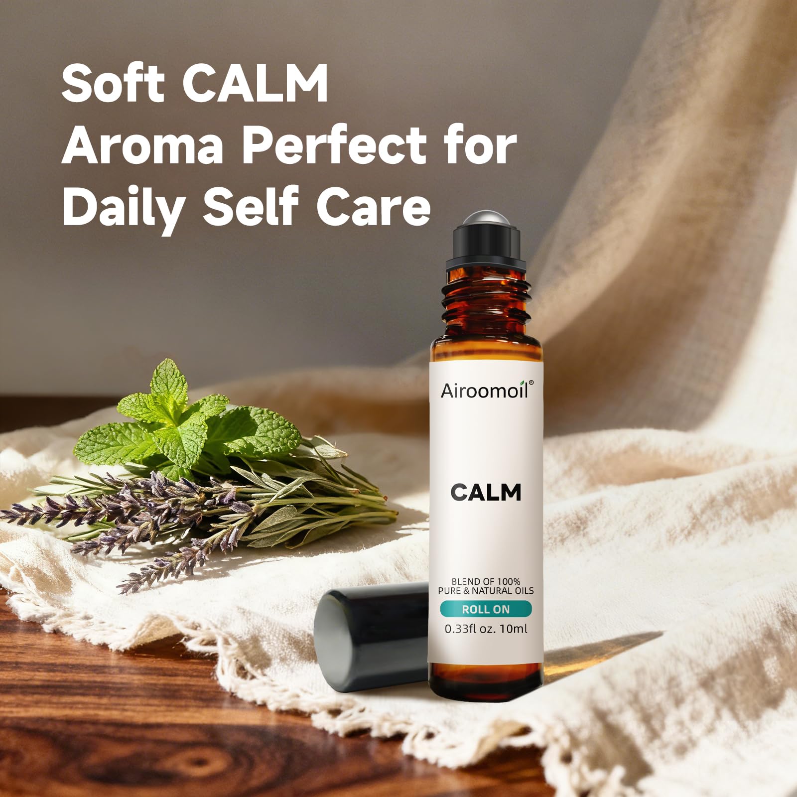 Airoomoil Calm roll-on on the neck area for a gentle aroma lift