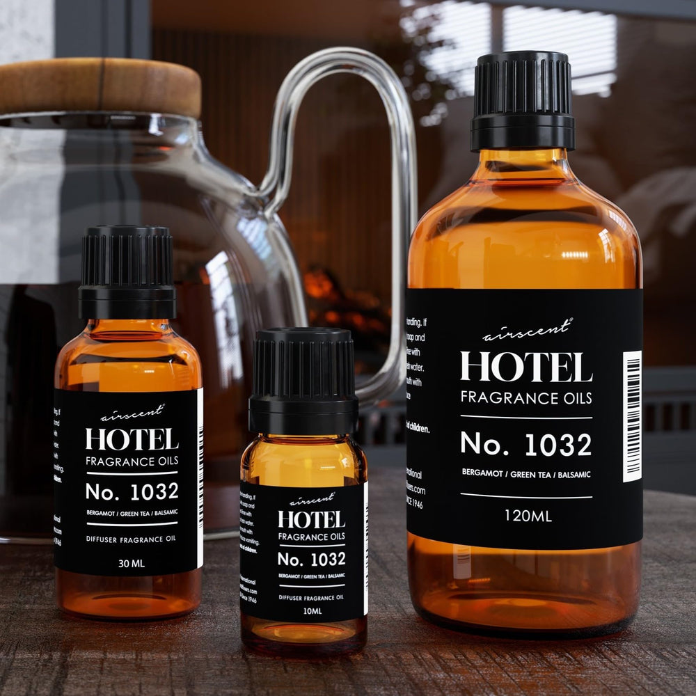 AirScent 1032 being poured into a diffuser for continuous scent diffusion.
