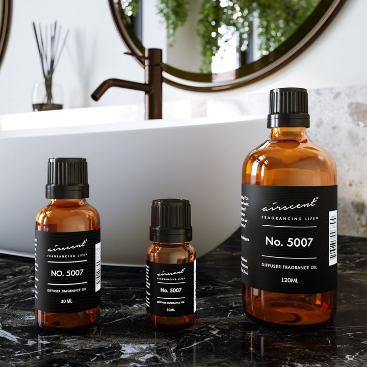 Air-Scent glass bottle in a diffuser setup for steady aroma.