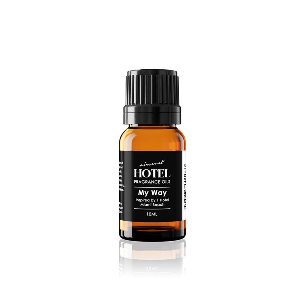 Air-Scent My Way diffuser oil bottle close-up with precise dropper.