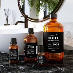 AirScent White Tea Aloe Vera Sandalwood fragrance in glass bottle for home spa ambiance.
