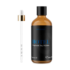 Airversa diffuser oil bottle with Hilton-inspired scent for calming spaces.