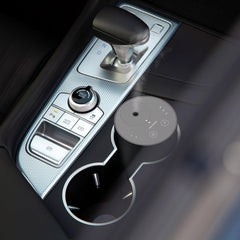 Airversa car cup holder diffuser demonstrates easy on-the-go fragrance in vehicles.