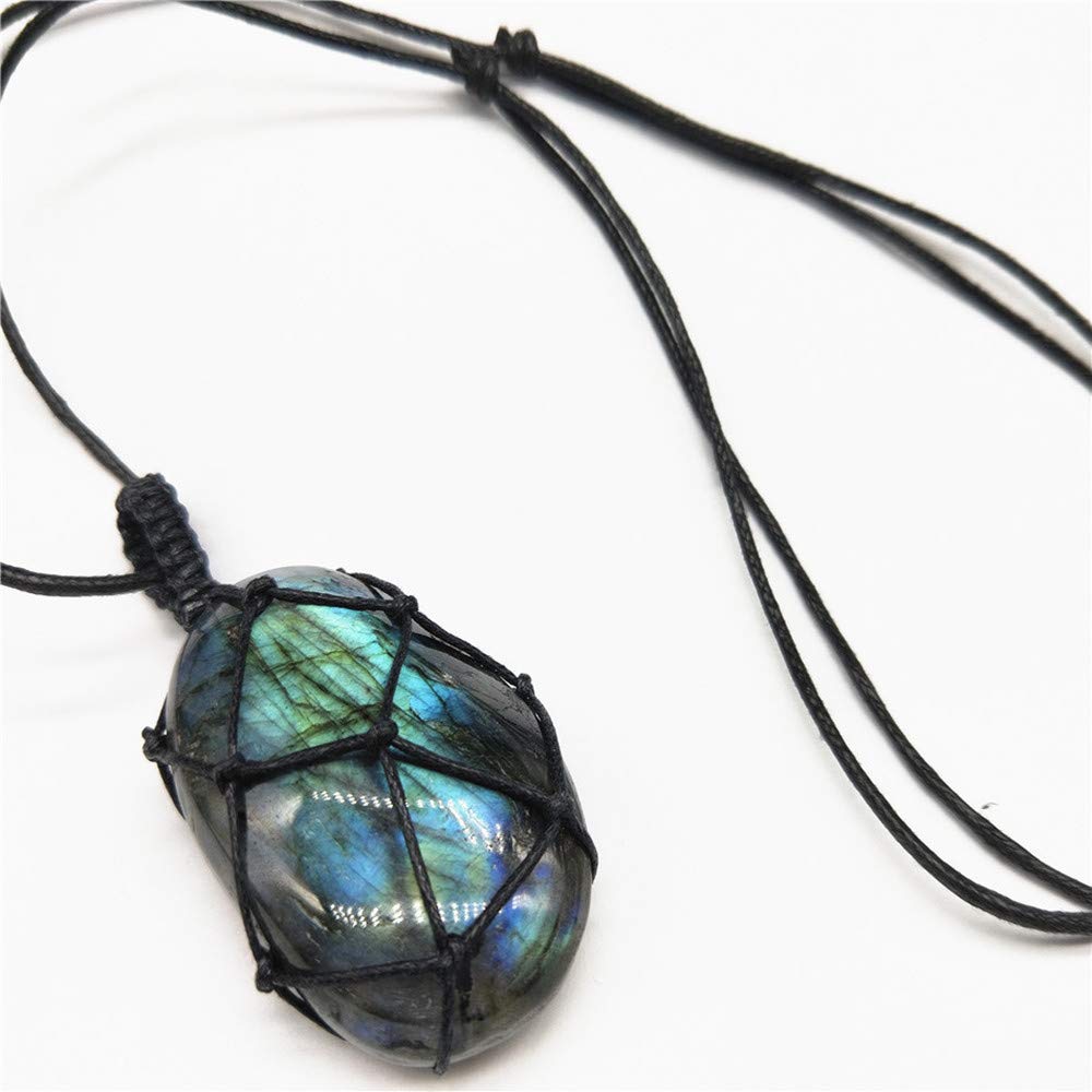 AiteleI Labradorite palm stone close-up showing natural color variations.