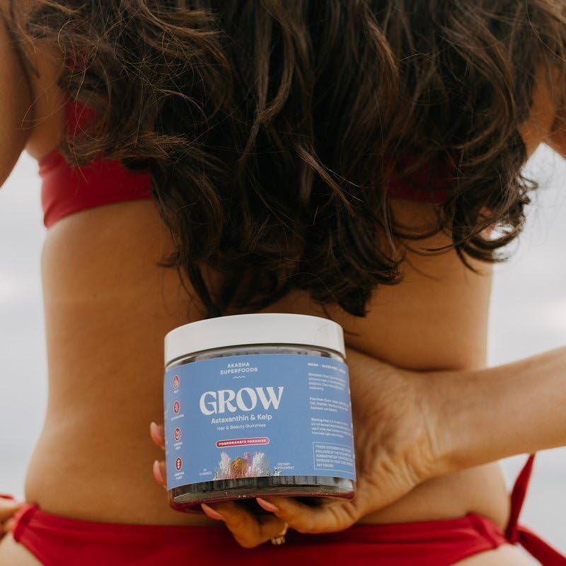 Akasha Grow Hair Gummies two-daily-dose presentation suggests convenient use.