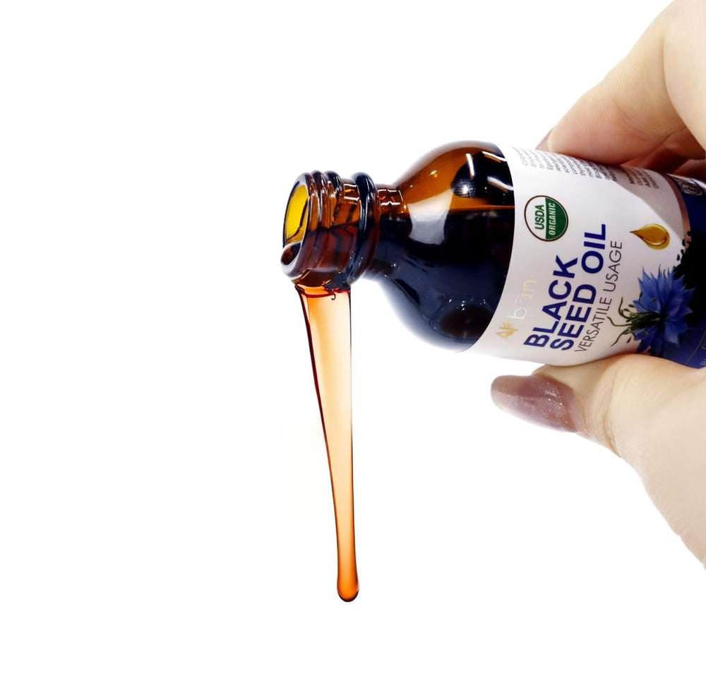 AKBAN skin-care application highlights antioxidant-rich oil for nourishing the complexion.