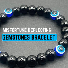AKDNZ polished black tourmaline beads on a protective bracelet.