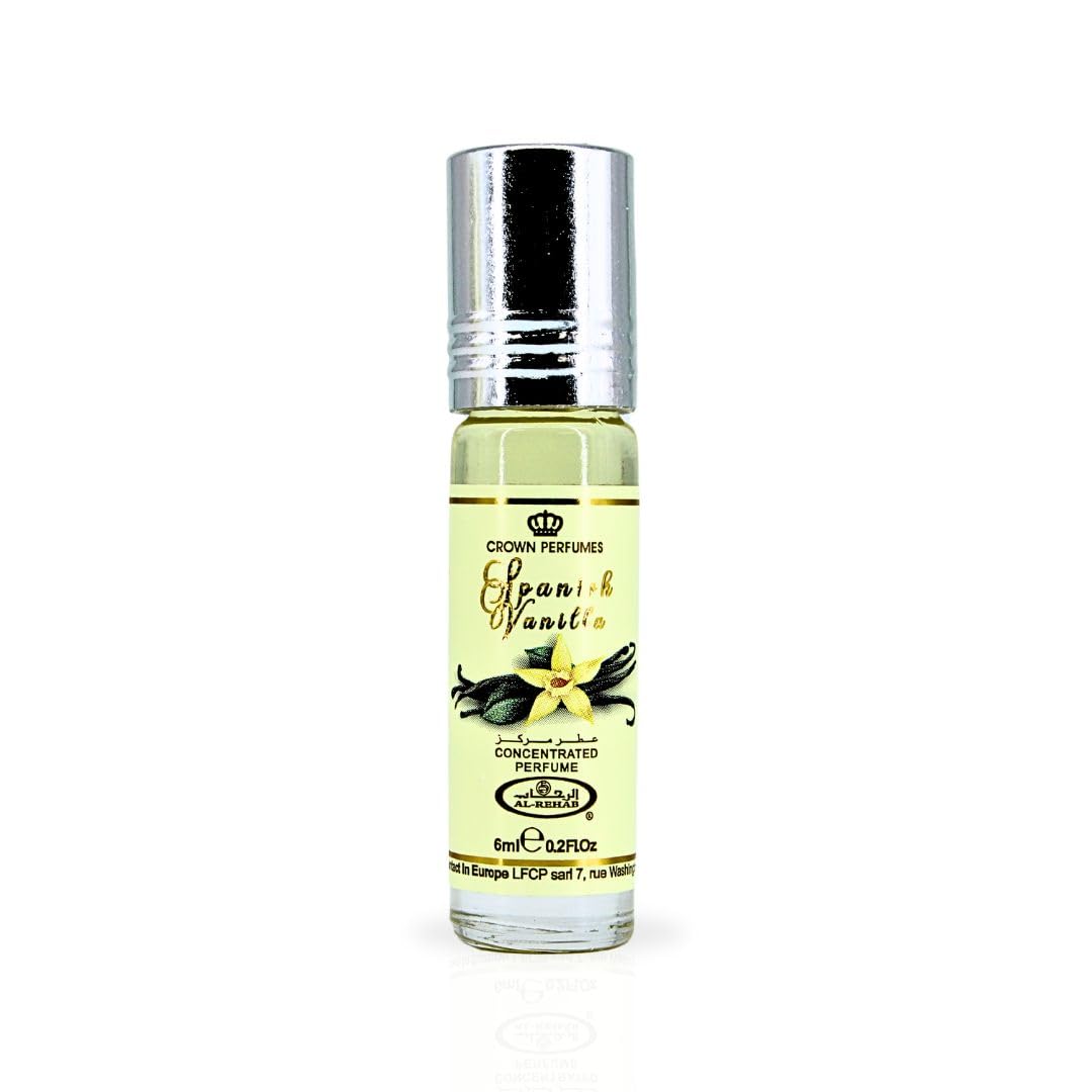 Pouring shot of Al-Rehab Spanish Vanilla perfume oil highlighting creamy top notes.