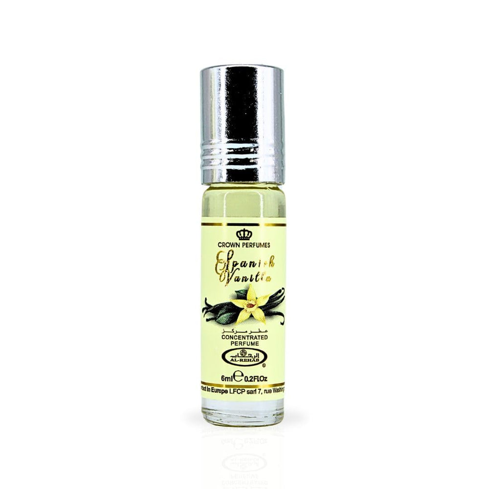 Pouring shot of Al-Rehab Spanish Vanilla perfume oil highlighting creamy top notes.