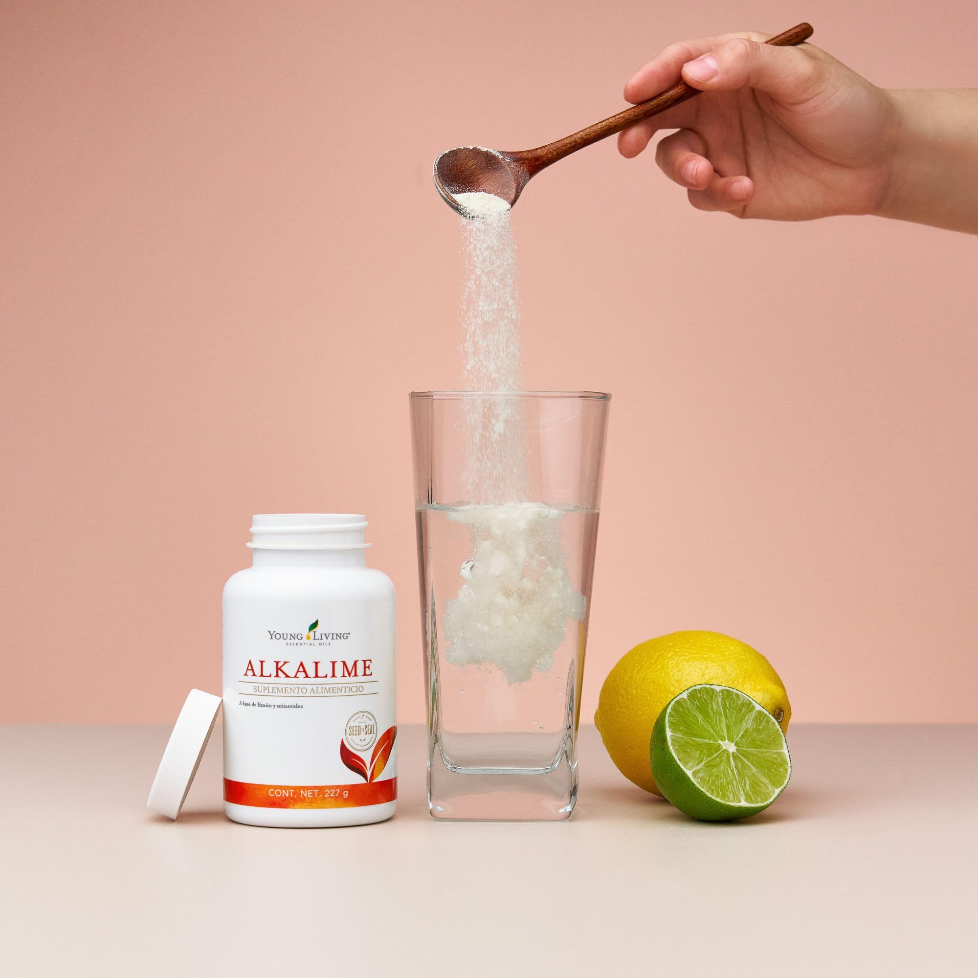 Pouring AlkaLime into a glass, crisp citrus aroma rises.