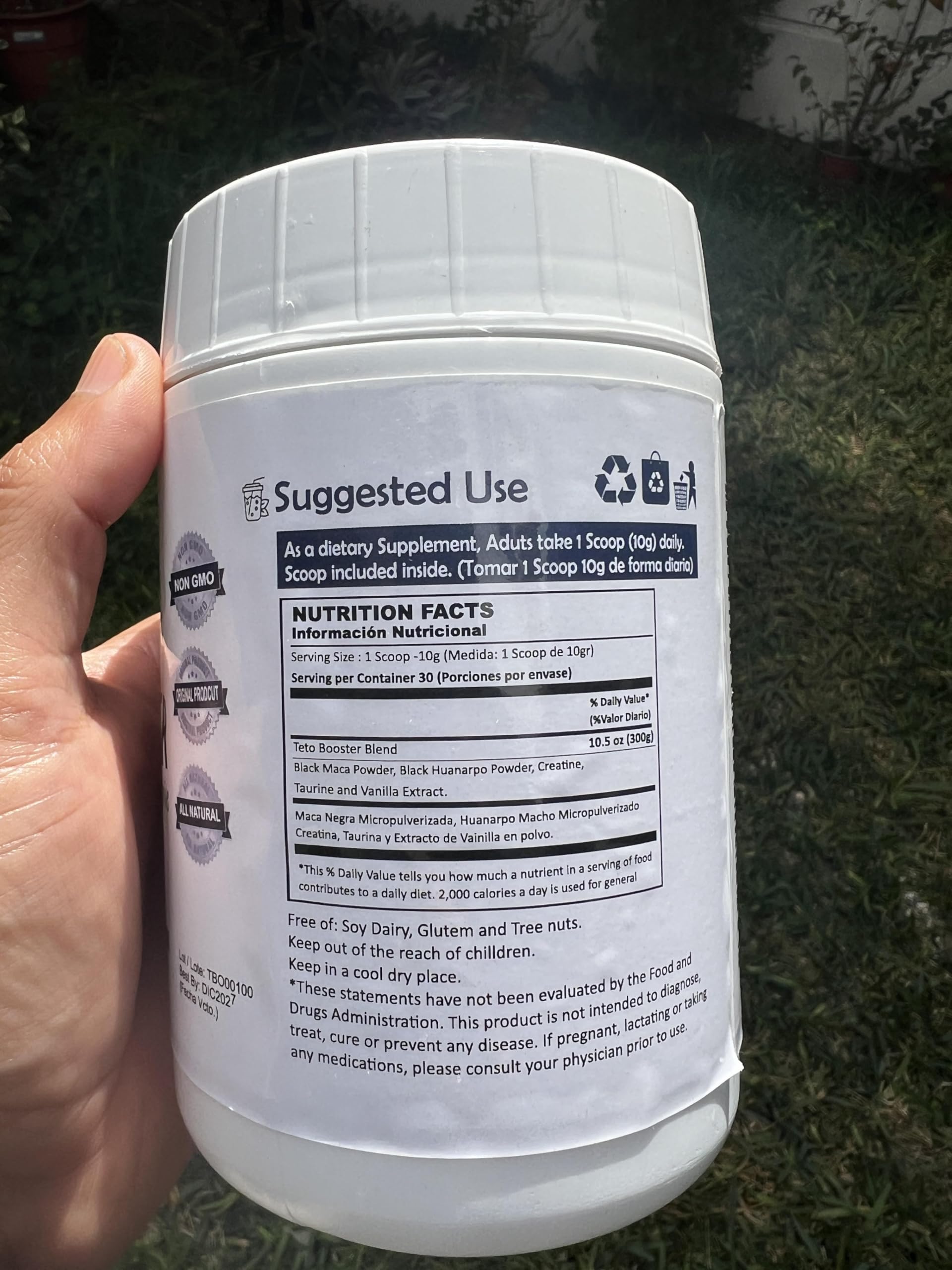 Alkaline Care TBooster powder in a glass ready for a daily shake.
