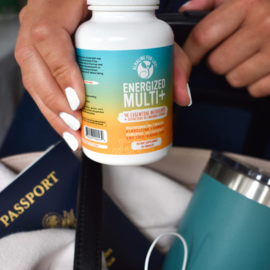 Holding Energized Multi bottle illustrates a practical everyday wellness choice.