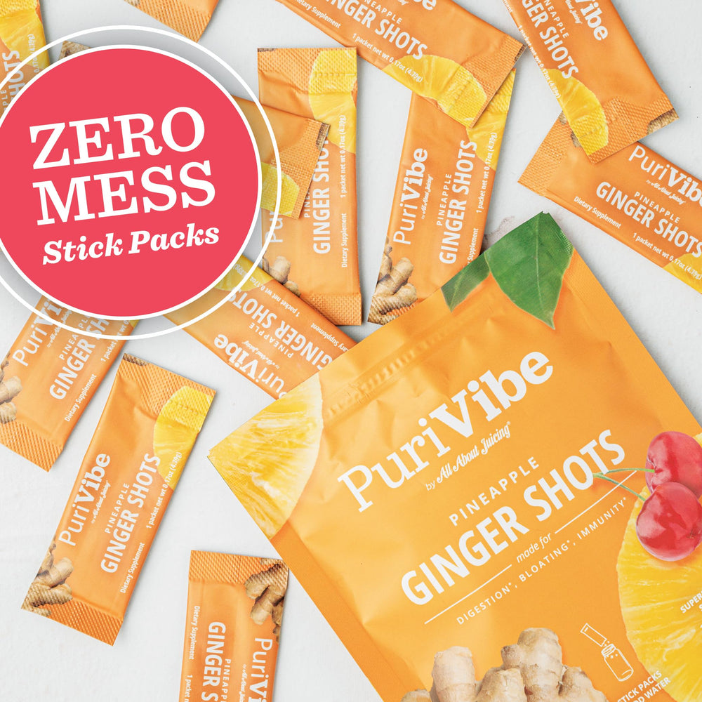 All About Juicing pineapple-ginger-turmeric blend in serving suggests refreshing, zesty aroma.