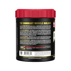 ALLMAX AMINOCORE powder being dispensed into a glass for mixing.