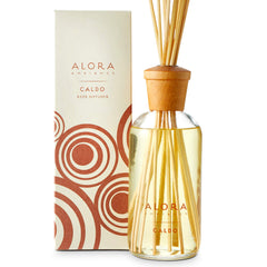 Alora Ambiance Caldo 16oz diffuser filling a living room with a welcoming scent