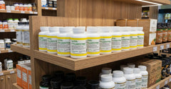 Alpha Cyclodextrin Capsules pour into hand, smooth transfer for easy consumption.