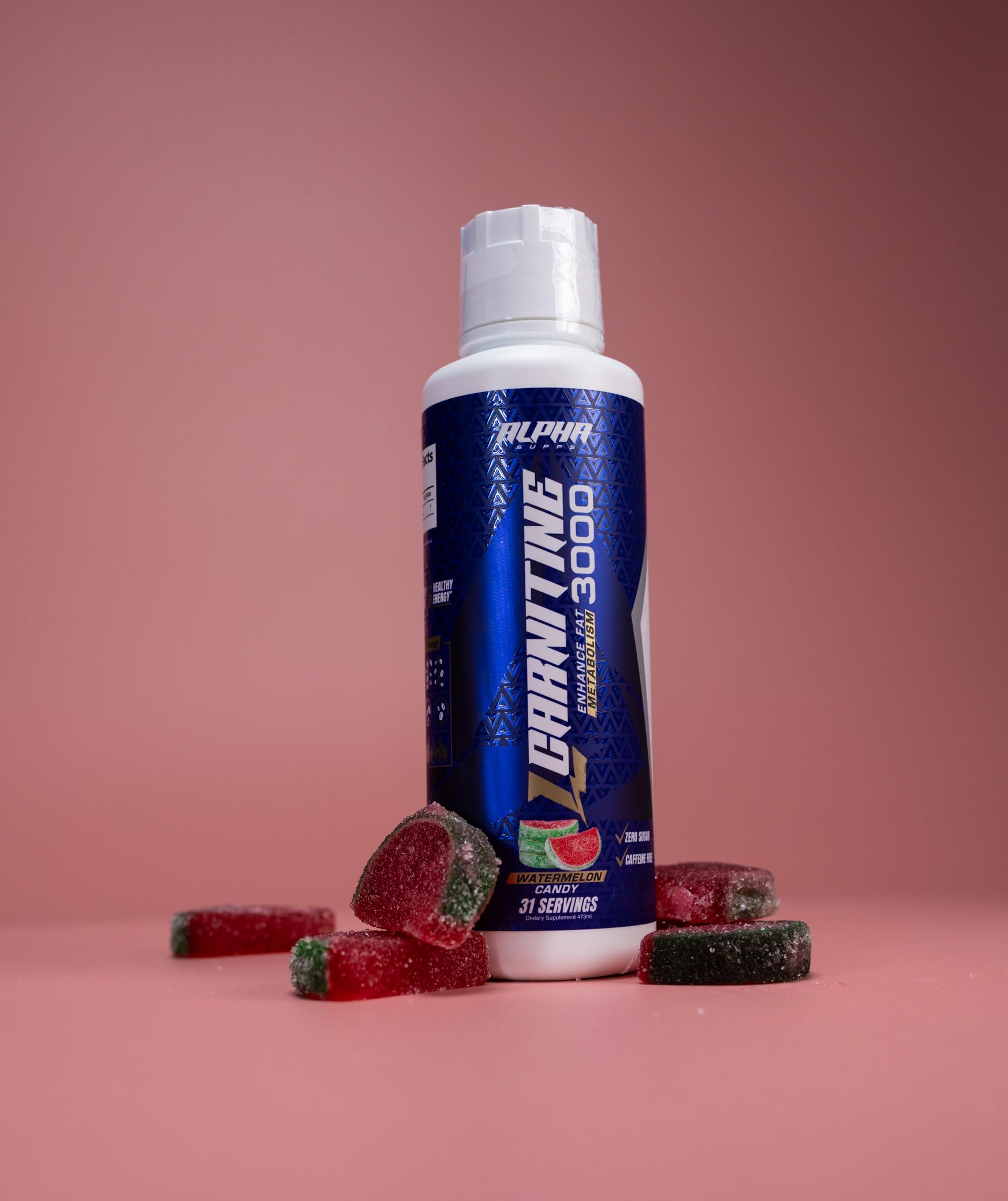 Athlete prepping for workout with Alpha Supps L-Carnitine 3000 in hand