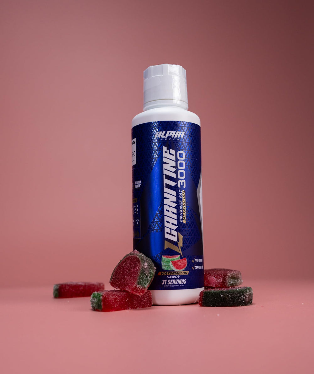 Athlete prepping for workout with Alpha Supps L-Carnitine 3000 in hand
