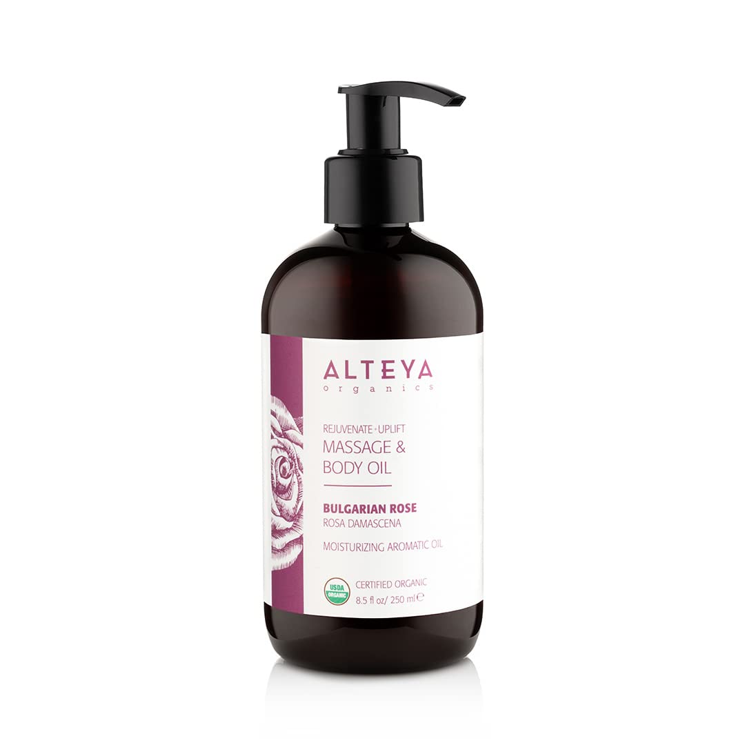 Alteya Organics Bulgarian Rose massage oil bottle pour for soothing skin and calming massage.