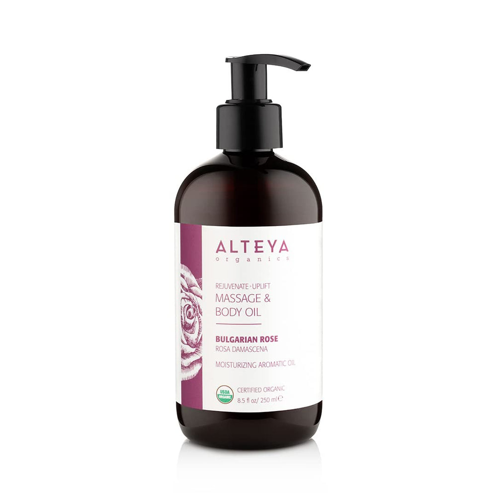 Alteya Organics Bulgarian Rose massage oil bottle pour for soothing skin and calming massage.