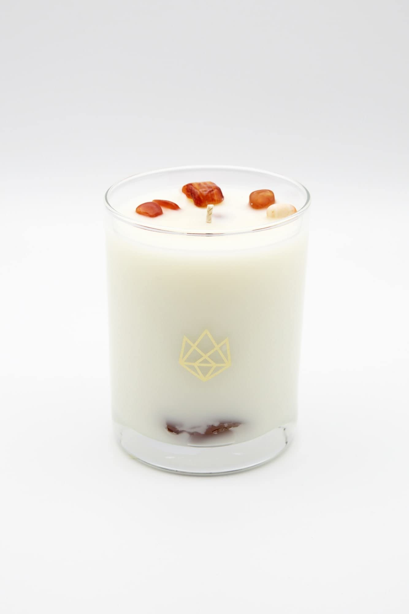 Aluminate Life red carnelian crystal-infused candle enhances courage and motivation vibes.