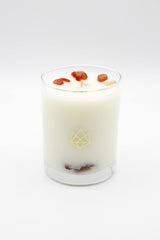 Aluminate Life red carnelian crystal-infused candle enhances courage and motivation vibes.