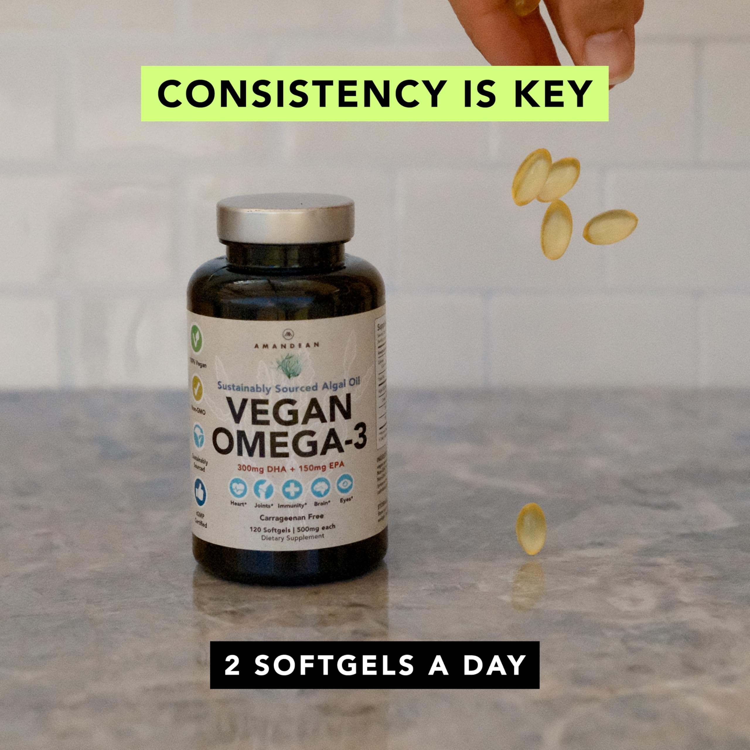 AMANDEAN bottle on desk with water, convenient daily omega-3 intake