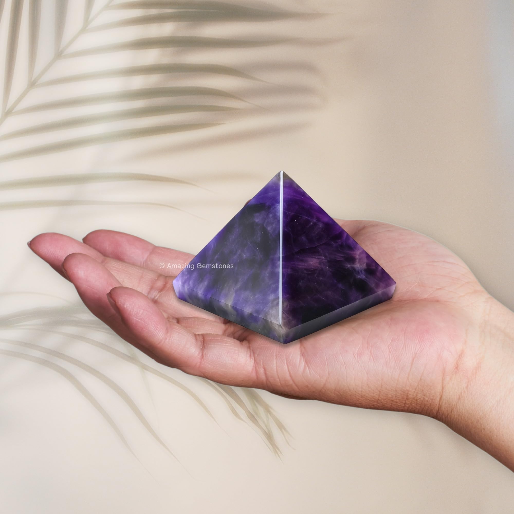 Amazing Gemstone amethyst pyramid handheld, tactile focal point for meditation.