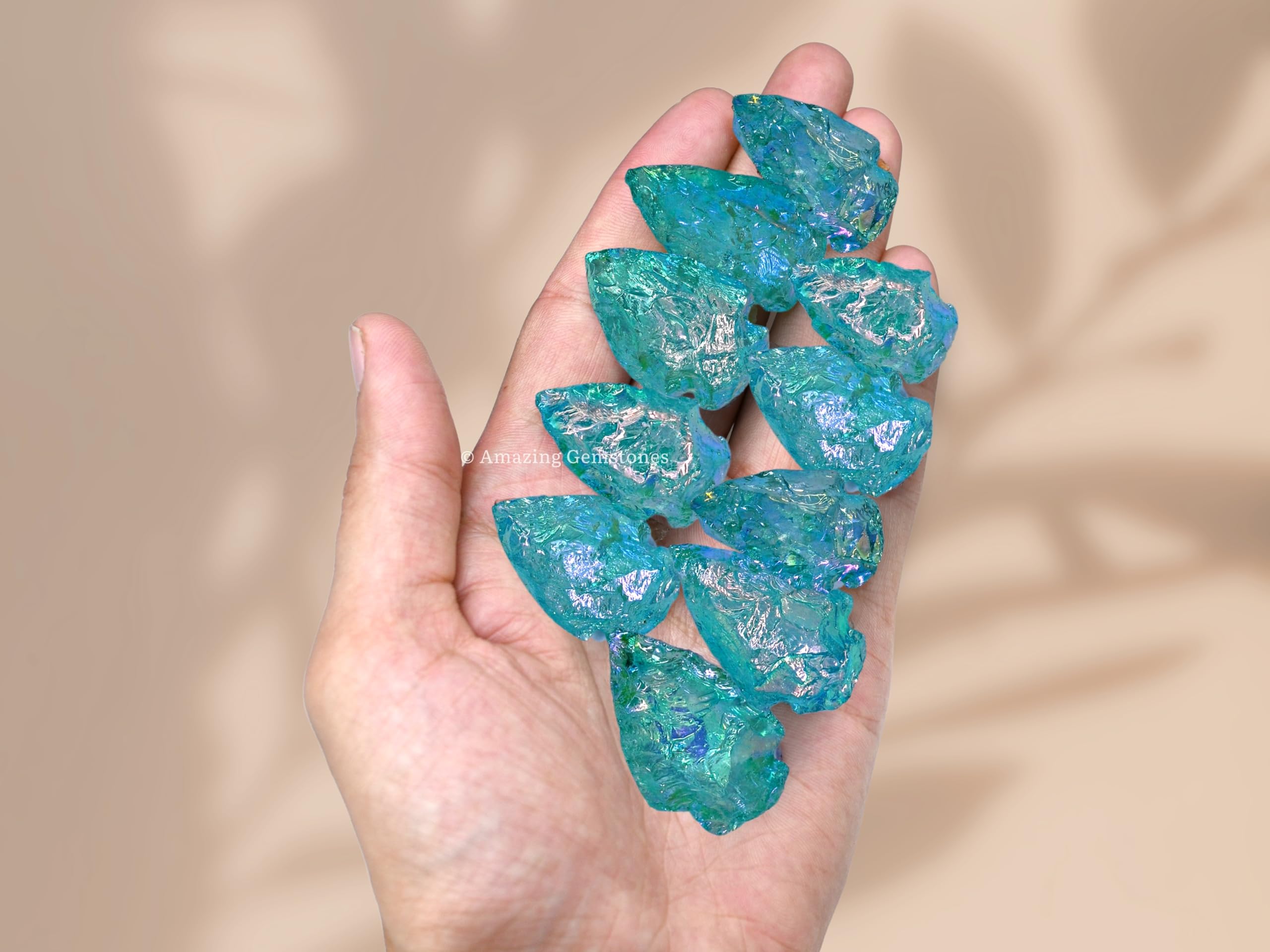 Amazing Gemstone Aqua Aura Quartz arrowhead ideal for DIY jewelry projects.