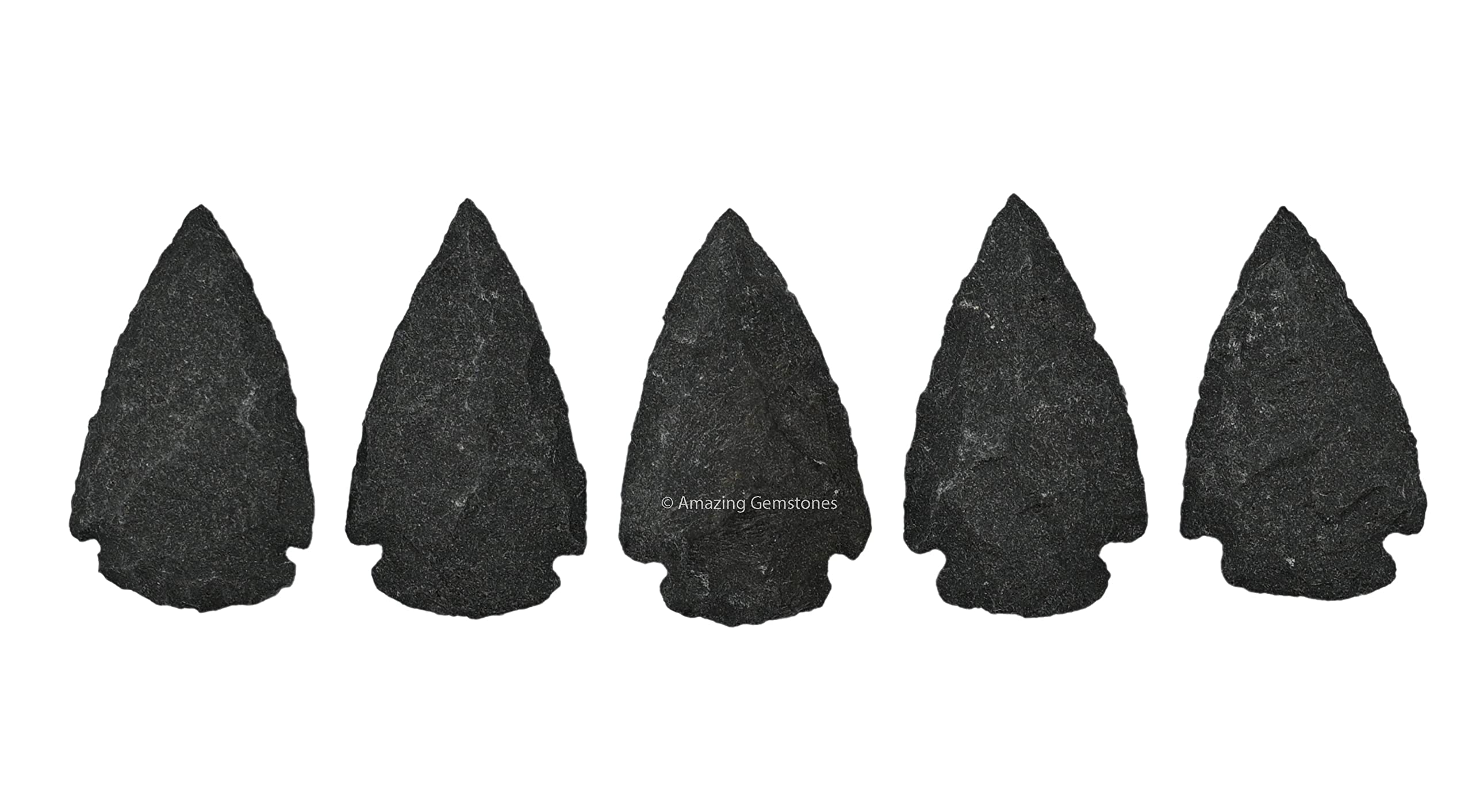 Amazing Gemstone black agate arrowhead close-up highlights pattern for crafts