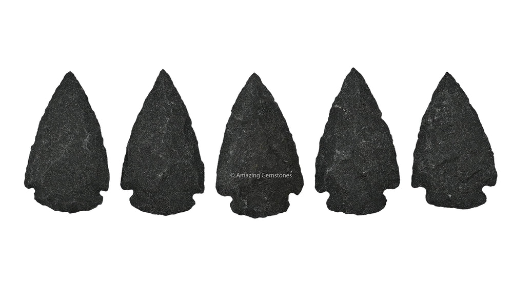 Amazing Gemstone black agate arrowhead close-up highlights pattern for crafts