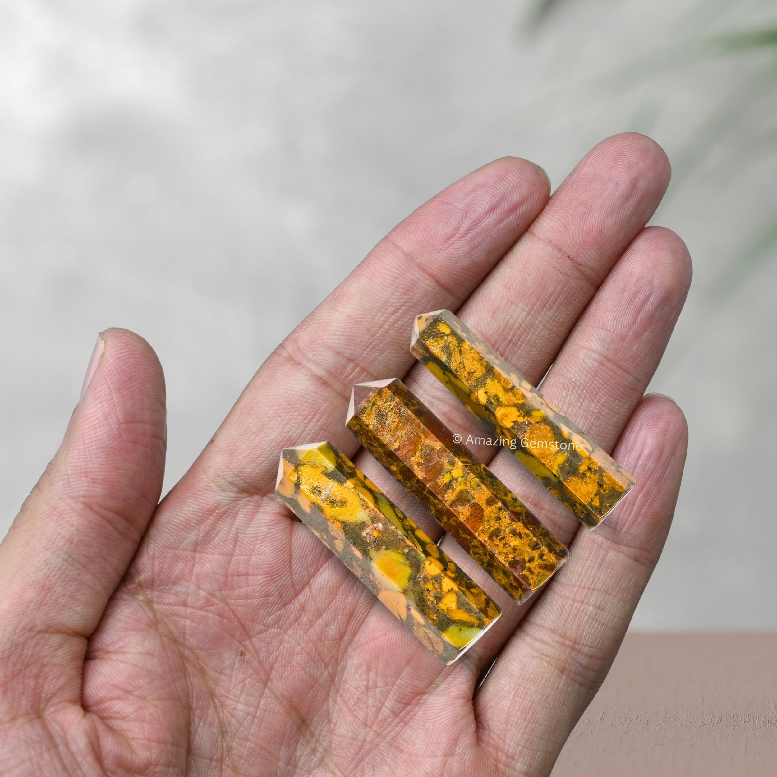 Amazing Gemstone Fruit Jasper crystal point shown during meditation for calm focus.