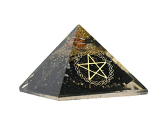 Amazing Gemstone Large Orgone Pyramid on desk adds calm ambiance to work area.