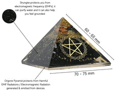 Amazing Gemstone Large Orgone Pyramid close-up shows crystal facets catching light for décor.